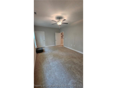 This luxury condo in Fairway Pointe in Anderson Creek Club is on Anderson Creek Golf Club in North Carolina - for sale on GolfHomes.com, golf home, golf lot