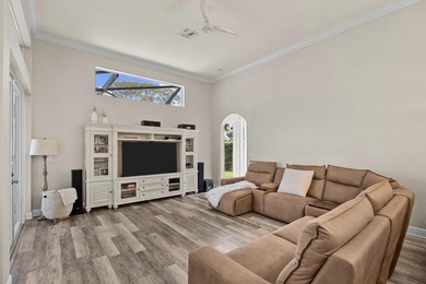 Experience luxury and privacy in this stunning home set on .67 on The Cape Club of Palm City in Florida - for sale on GolfHomes.com, golf home, golf lot