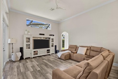 Experience luxury and privacy in this stunning home set on .67 on The Cape Club of Palm City in Florida - for sale on GolfHomes.com, golf home, golf lot