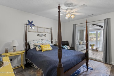 Welcome home to 7212 Windward Drive inside of the immaculate on Harbour Point Golf Club in North Carolina - for sale on GolfHomes.com, golf home, golf lot