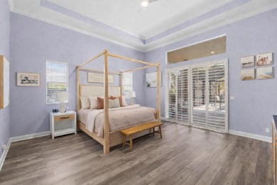 Experience luxury and privacy in this stunning home set on .67 on The Cape Club of Palm City in Florida - for sale on GolfHomes.com, golf home, golf lot