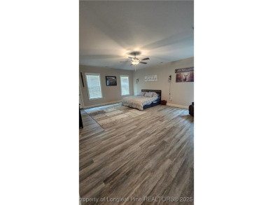 This luxury condo in Fairway Pointe in Anderson Creek Club is on Anderson Creek Golf Club in North Carolina - for sale on GolfHomes.com, golf home, golf lot