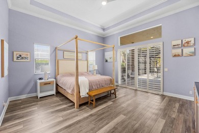 Experience luxury and privacy in this stunning home set on .67 on The Cape Club of Palm City in Florida - for sale on GolfHomes.com, golf home, golf lot