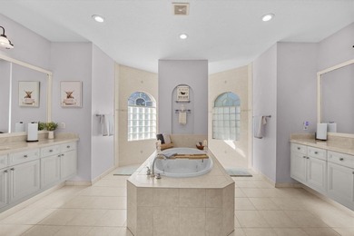 Experience luxury and privacy in this stunning home set on .67 on The Cape Club of Palm City in Florida - for sale on GolfHomes.com, golf home, golf lot