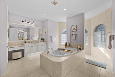 Experience luxury and privacy in this stunning home set on .67 on The Cape Club of Palm City in Florida - for sale on GolfHomes.com, golf home, golf lot