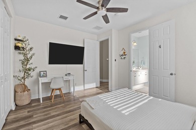 Experience luxury and privacy in this stunning home set on .67 on The Cape Club of Palm City in Florida - for sale on GolfHomes.com, golf home, golf lot