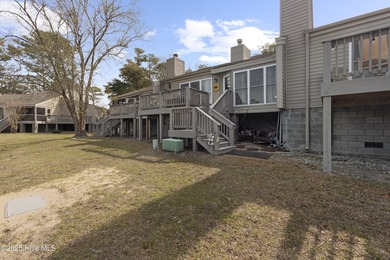 Welcome home to 7212 Windward Drive inside of the immaculate on Harbour Point Golf Club in North Carolina - for sale on GolfHomes.com, golf home, golf lot