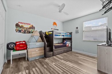 Experience luxury and privacy in this stunning home set on .67 on The Cape Club of Palm City in Florida - for sale on GolfHomes.com, golf home, golf lot