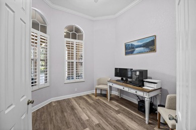 Experience luxury and privacy in this stunning home set on .67 on The Cape Club of Palm City in Florida - for sale on GolfHomes.com, golf home, golf lot