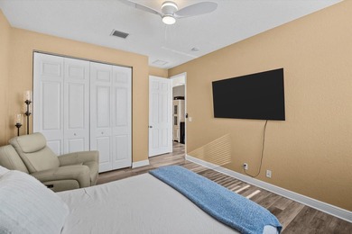 Experience luxury and privacy in this stunning home set on .67 on The Cape Club of Palm City in Florida - for sale on GolfHomes.com, golf home, golf lot