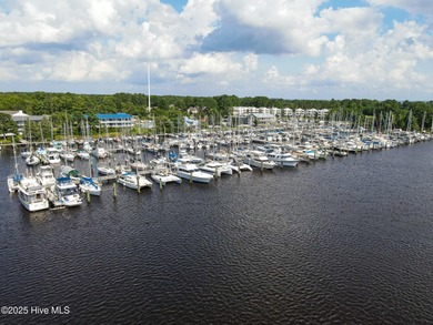 Welcome home to 7212 Windward Drive inside of the immaculate on Harbour Point Golf Club in North Carolina - for sale on GolfHomes.com, golf home, golf lot
