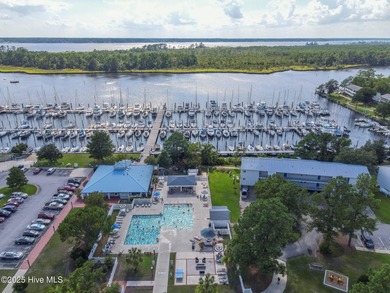 Welcome home to 7212 Windward Drive inside of the immaculate on Harbour Point Golf Club in North Carolina - for sale on GolfHomes.com, golf home, golf lot