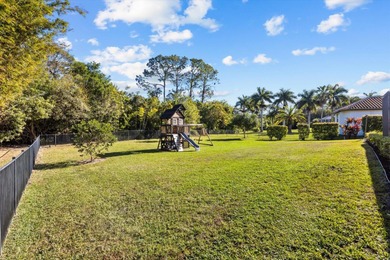Experience luxury and privacy in this stunning home set on .67 on The Cape Club of Palm City in Florida - for sale on GolfHomes.com, golf home, golf lot