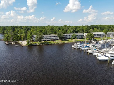 Welcome home to 7212 Windward Drive inside of the immaculate on Harbour Point Golf Club in North Carolina - for sale on GolfHomes.com, golf home, golf lot
