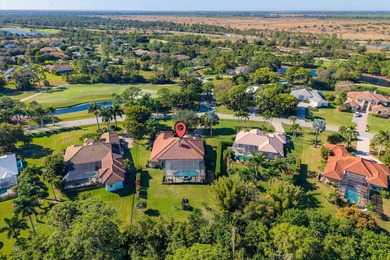 Experience luxury and privacy in this stunning home set on .67 on The Cape Club of Palm City in Florida - for sale on GolfHomes.com, golf home, golf lot