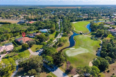 Experience luxury and privacy in this stunning home set on .67 on The Cape Club of Palm City in Florida - for sale on GolfHomes.com, golf home, golf lot