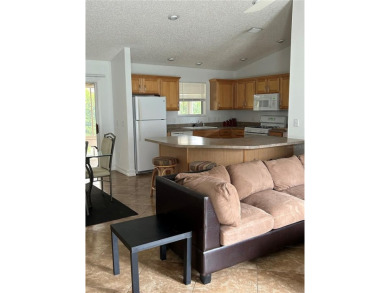 This 2-bedroom, 2-bath Austin Model home is located in the on Glenview Championship Golf and Country Club in Florida - for sale on GolfHomes.com, golf home, golf lot