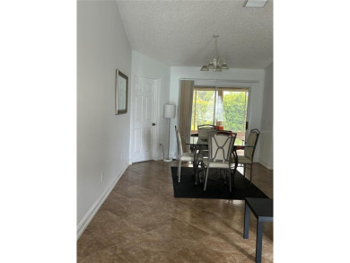 This 2-bedroom, 2-bath Austin Model home is located in the on Glenview Championship Golf and Country Club in Florida - for sale on GolfHomes.com, golf home, golf lot