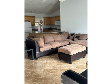 This 2-bedroom, 2-bath Austin Model home is located in the on Glenview Championship Golf and Country Club in Florida - for sale on GolfHomes.com, golf home, golf lot
