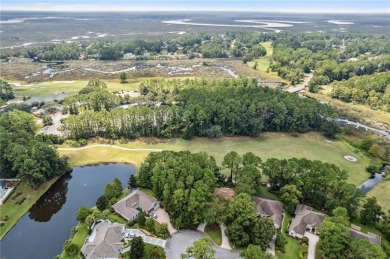 Discover the perfect blend of tranquility and convenience with on The Club At Osprey Cove in Georgia - for sale on GolfHomes.com, golf home, golf lot