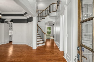 Welcome to timeless elegance in the exclusive, gated Creekside on The Golf Club of Georgia in Georgia - for sale on GolfHomes.com, golf home, golf lot