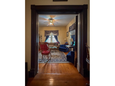 Charming Victorian Cottage w/wrap around porch on tree lined on Bay Creek Golf Club in Virginia - for sale on GolfHomes.com, golf home, golf lot