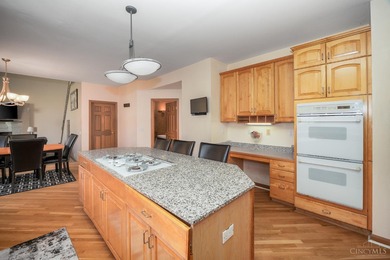 Spacious home featuring an elegant, well-designed layout in the on Beckett Ridge Golf Club in Ohio - for sale on GolfHomes.com, golf home, golf lot