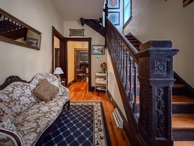 Charming Victorian Cottage w/wrap around porch on tree lined on Bay Creek Golf Club in Virginia - for sale on GolfHomes.com, golf home, golf lot