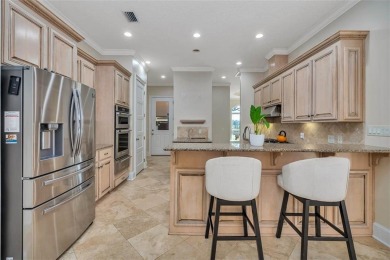 Absolutely Stunning! From the moment you walk in the travertine on Oak Grove Island Golf and Country Club in Georgia - for sale on GolfHomes.com, golf home, golf lot
