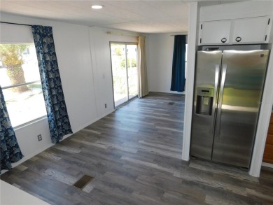 This one just keeps getting better! NEW front porch screen room on Betmar Acres Golf Club in Florida - for sale on GolfHomes.com, golf home, golf lot