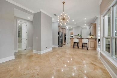 Absolutely Stunning! From the moment you walk in the travertine on Oak Grove Island Golf and Country Club in Georgia - for sale on GolfHomes.com, golf home, golf lot