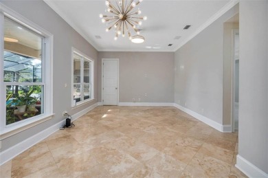 Absolutely Stunning! From the moment you walk in the travertine on Oak Grove Island Golf and Country Club in Georgia - for sale on GolfHomes.com, golf home, golf lot