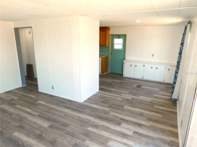 This one just keeps getting better! NEW front porch screen room on Betmar Acres Golf Club in Florida - for sale on GolfHomes.com, golf home, golf lot