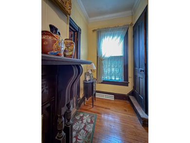 Charming Victorian Cottage w/wrap around porch on tree lined on Bay Creek Golf Club in Virginia - for sale on GolfHomes.com, golf home, golf lot