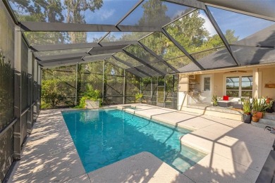 Absolutely Stunning! From the moment you walk in the travertine on Oak Grove Island Golf and Country Club in Georgia - for sale on GolfHomes.com, golf home, golf lot