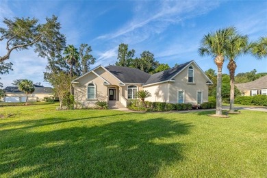 Absolutely Stunning! From the moment you walk in the travertine on Oak Grove Island Golf and Country Club in Georgia - for sale on GolfHomes.com, golf home, golf lot