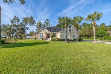 Absolutely Stunning! From the moment you walk in the travertine on Oak Grove Island Golf and Country Club in Georgia - for sale on GolfHomes.com, golf home, golf lot