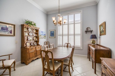 Expansive southern lake and golf views highlight this on Ironhorse Country Club in Florida - for sale on GolfHomes.com, golf home, golf lot