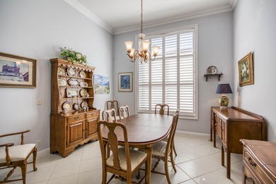 Expansive southern lake and golf views highlight this on Ironhorse Country Club in Florida - for sale on GolfHomes.com, golf home, golf lot