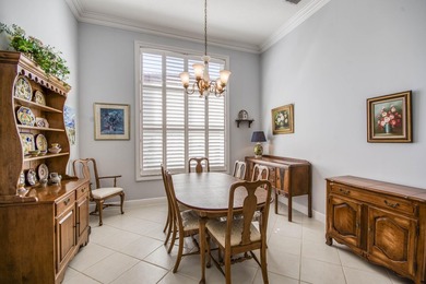 Expansive southern lake and golf views highlight this on Ironhorse Country Club in Florida - for sale on GolfHomes.com, golf home, golf lot