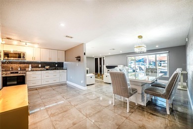 Welcome to this impeccably maintained, move-in-ready 4-bedroom on Beacon Woods Golf Club in Florida - for sale on GolfHomes.com, golf home, golf lot