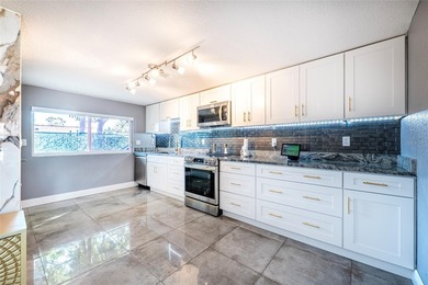 Welcome to this impeccably maintained, move-in-ready 4-bedroom on Beacon Woods Golf Club in Florida - for sale on GolfHomes.com, golf home, golf lot