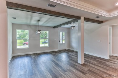This 3/2/2 is brand new and sits on a third of an acre nicely on Citrus Springs Country Club in Florida - for sale on GolfHomes.com, golf home, golf lot