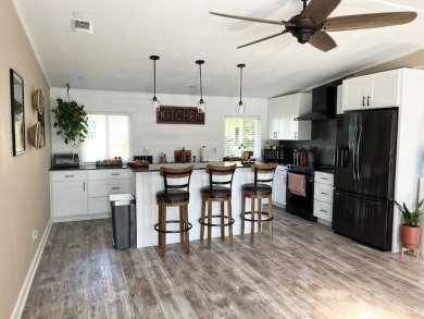 ONE OF A KIND contemporary 3bd/2ba CASA GRANDE remodeled home on Del Tura Golf and Country Club in Florida - for sale on GolfHomes.com, golf home, golf lot