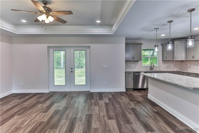 This 3/2/2 is brand new and sits on a third of an acre nicely on Citrus Springs Country Club in Florida - for sale on GolfHomes.com, golf home, golf lot