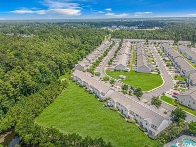 If you've been looking for a large 3 bedroom town home in the on Wild Wing Plantation in South Carolina - for sale on GolfHomes.com, golf home, golf lot