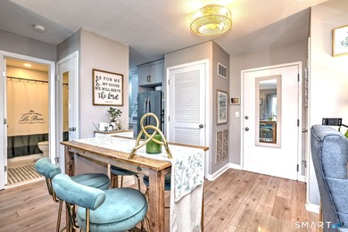 Wake up to peaceful golf and water views in this charming on Short Beach Golf Course in Connecticut - for sale on GolfHomes.com, golf home, golf lot