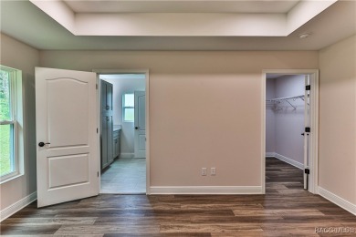 This 3/2/2 is brand new and sits on a third of an acre nicely on Citrus Springs Country Club in Florida - for sale on GolfHomes.com, golf home, golf lot