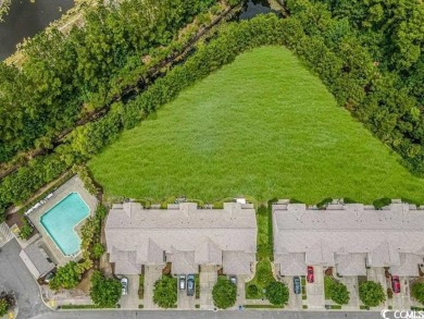 If you've been looking for a large 3 bedroom town home in the on Wild Wing Plantation in South Carolina - for sale on GolfHomes.com, golf home, golf lot