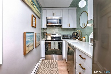 Wake up to peaceful golf and water views in this charming on Short Beach Golf Course in Connecticut - for sale on GolfHomes.com, golf home, golf lot